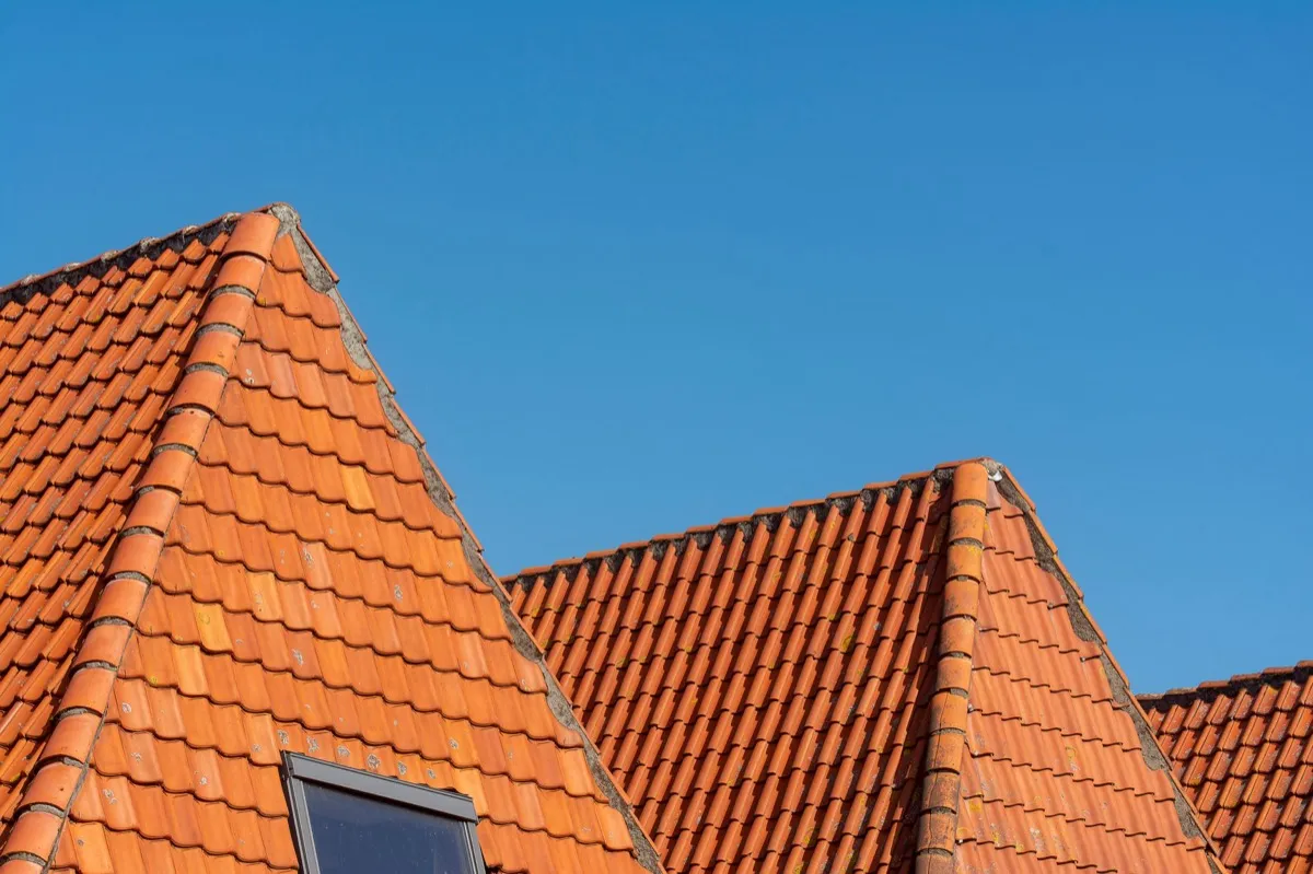 Clay barrel tile rooflines on homes in Fort Wayne, IN