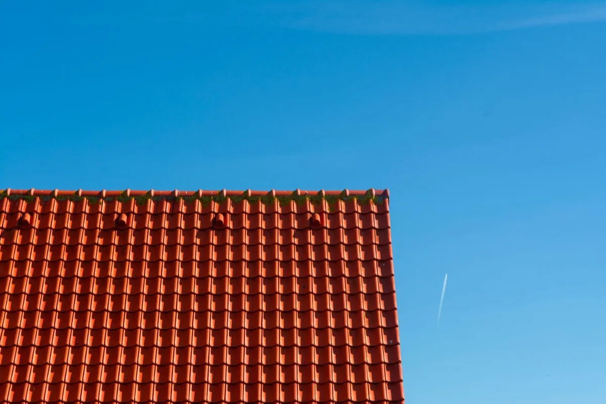 Tile roof gable in full sun, the kind of exposure that sets roof life in Fort Wayne, IN
